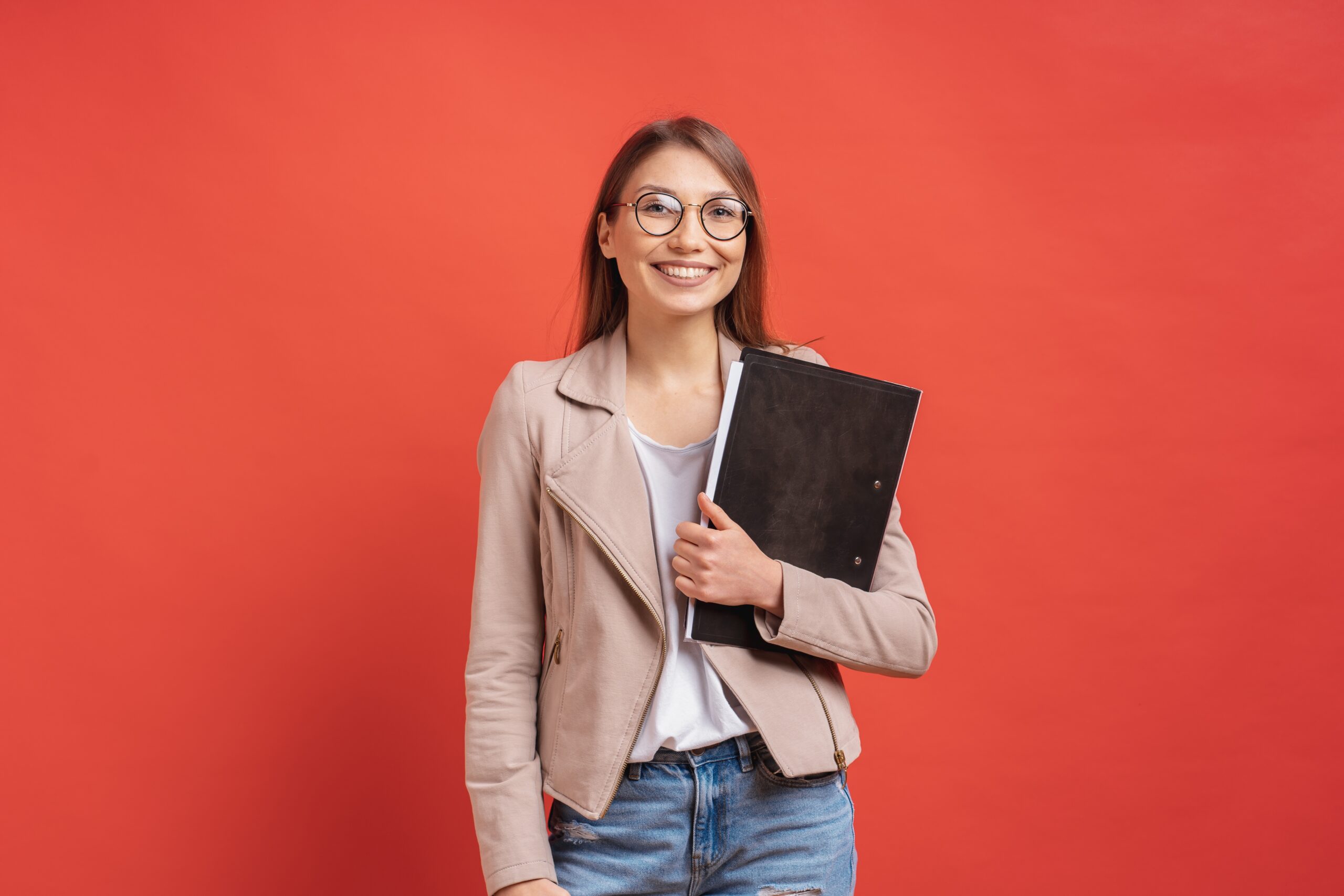 Entry-level marketing professional holding a clipboard